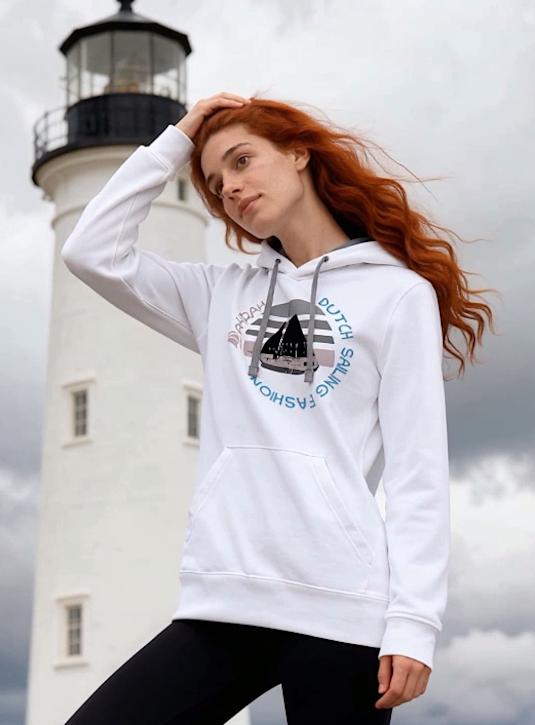 Unisex sailing hoodie with print of a Dutch traditional sailboat.